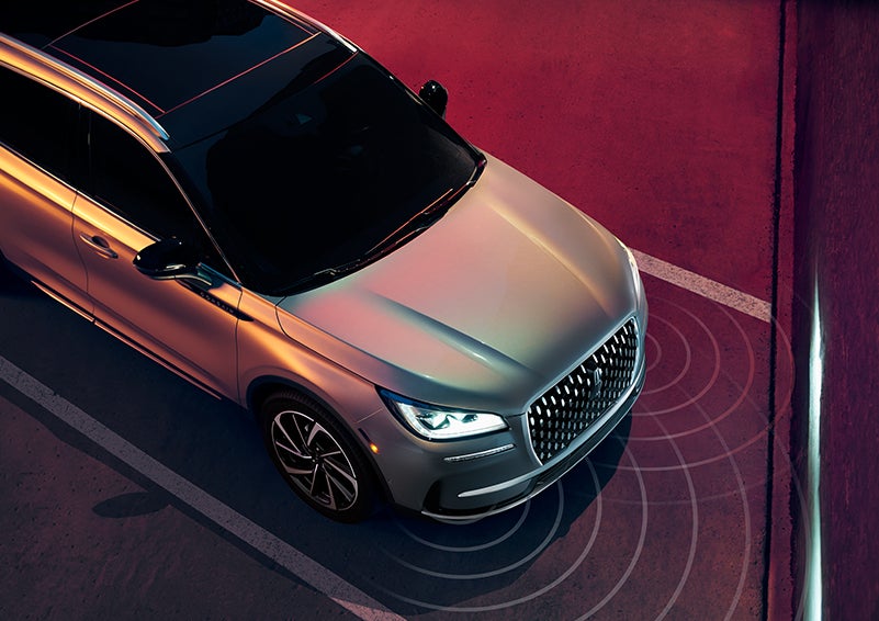 Illustrated radar signals are shown emitting from the front of a 2024 Lincoln Corsair® SUV. | Covert Lincoln Austin in Austin TX