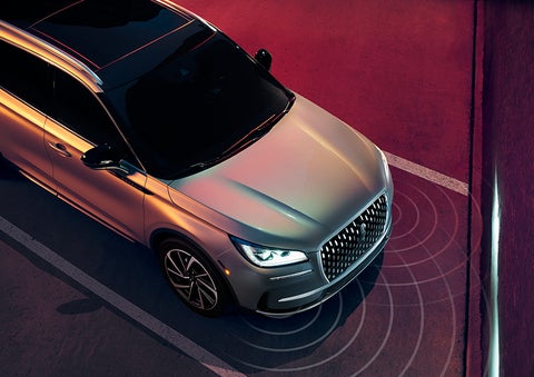 Illustrated radar signals are shown emitting from the front of a 2024 Lincoln Corsair® SUV. | Covert Lincoln Austin in Austin TX