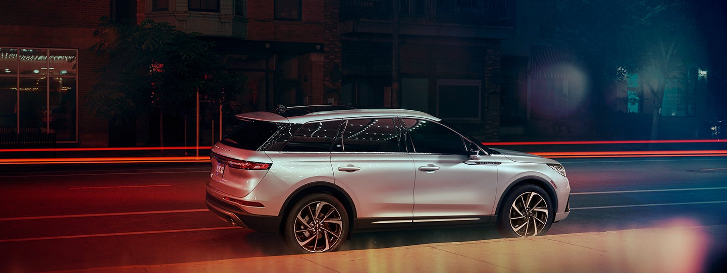 The 2024 Lincoln Corsair® SUV is parked on a city street at night. | Covert Lincoln Austin in Austin TX
