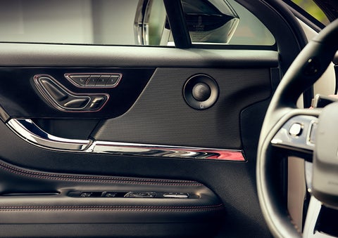 The driver of a 2024 Lincoln Corsair® SUV is shown selecting the drive mode. | Covert Lincoln Austin in Austin TX