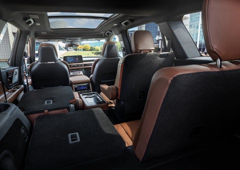 The interior of the 2025 Lincoln Aviator® SUV is shown with two seats folded down for added space. | Covert Lincoln Austin in Austin TX