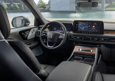 The interior of the 2025 Lincoln Aviator® SUV is shown parked with a view of a harbor through the windshield. | Covert Lincoln Austin in Austin TX