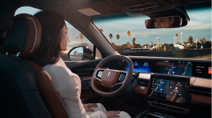 A person is shown driving hands-free on the highway with available Lincoln BlueCruise technology. | Covert Lincoln Austin in Austin TX