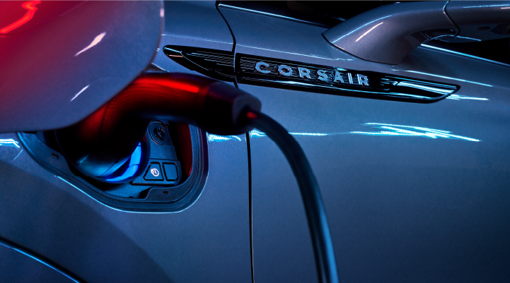 A charger plugged into the charging port of a 2025 Lincoln Corsair® Plug-in Hybrid model. | Covert Lincoln Austin in Austin TX