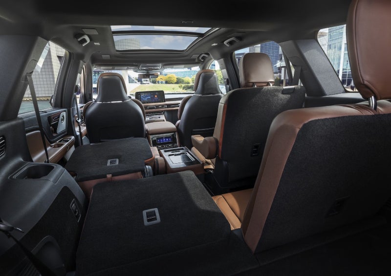 One side of the PowerFold® third-row seat and a second-row seat are folded forward in the 2026 Lincoln Aviator® SUV. | Covert Lincoln Austin in Austin TX