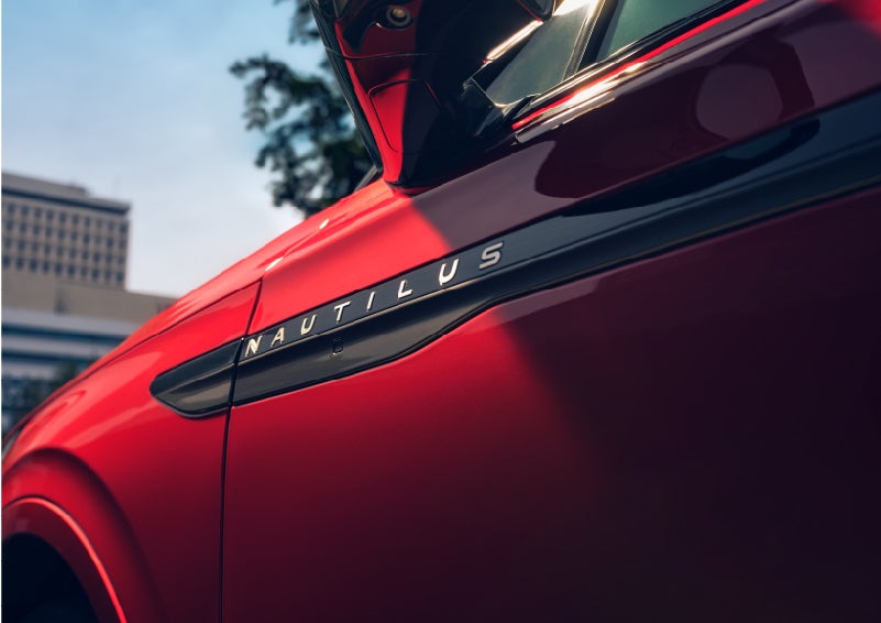A side badge on the passenger door reads Nautilus. | Covert Lincoln Austin in Austin TX