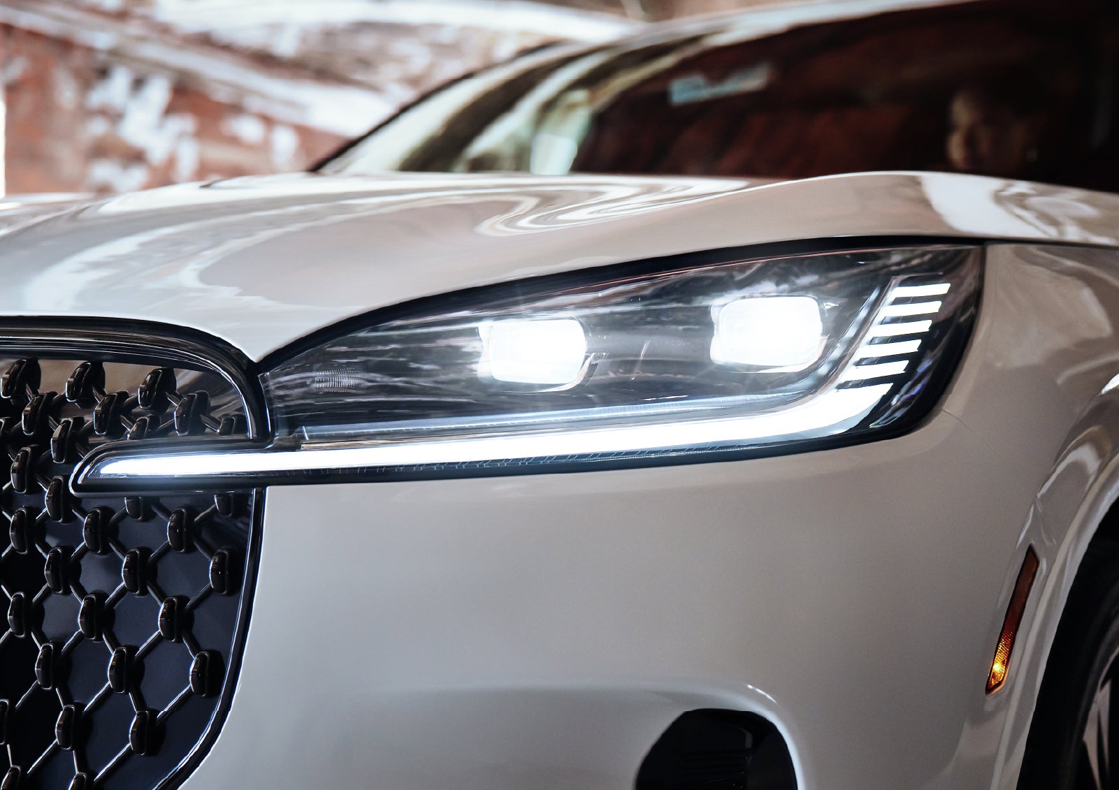 A close-up of a headlamp on the 2027 Lincoln Aviator® SUV is shown. | Covert Lincoln Austin in Austin TX